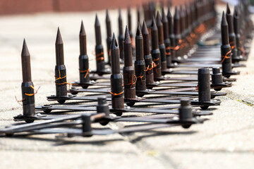 Police road block with metal a sharp  spikes