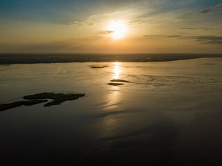 Sunrise over the wide river Dnieper. Aerial drone view.