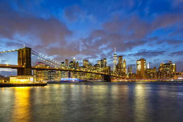 Fototapeta na wymiar New York City skyline night Manhattan town Brooklyn Bridge World Trade Center
