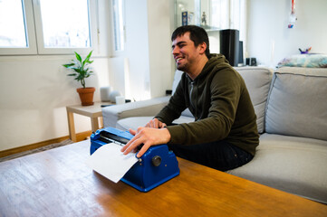 Blind man typing on typewriter with braille code