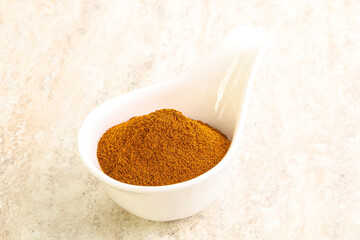 Dry Paprika powder in the bowl
