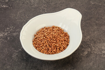 Raw buсkwheat cereal in the bowl