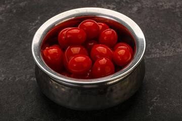 Pickled cherry tomatoes in the bowl
