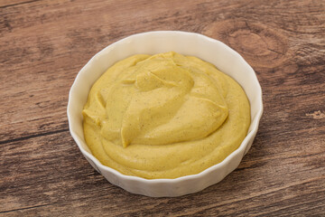 Dijon mustard sauce in the bowl