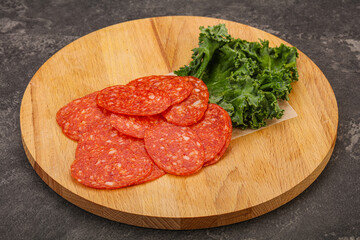 Italian spycy pepperoni sausage slices