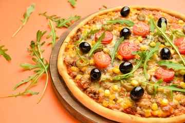 Board with tasty pizza on color background, closeup