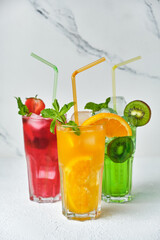 mix of three bright colored delicious cold lemonade