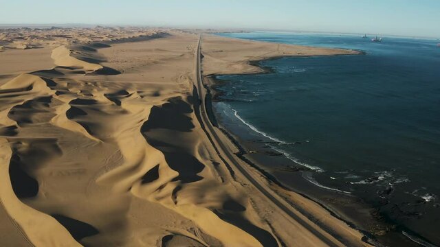 Scenic aerial view of the road that runs along the coastline from Swakopmund to Walvis Bay