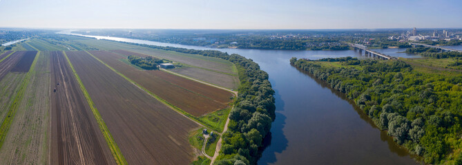 Aerial view of agricultural fields and Shchurovsky cement plant Holcim. Confluence of Moscow and...
