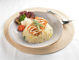 chef wok fried rice with crispy chicken chop cutlet and side salad on white table restaurant asian cafe halal chinese banquet menu