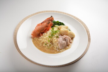 chef wok fried rice with seafood big tiger prawn and meat in thick gravy sauce asian halal menu
