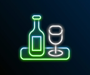 Glowing neon line Wine bottle with glass icon isolated on black background. Colorful outline concept. Vector