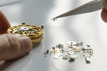 Watchmaker repair mechanical watches. Gears repair. Watch repair process