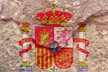 Faded Spain national royal emblem symbol, Coat of arms of Spain isolated on weathered solid rock...