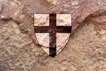 Teutonic Order cross icon on weathered solid stone wall background, symbol of the Order of Brothers...