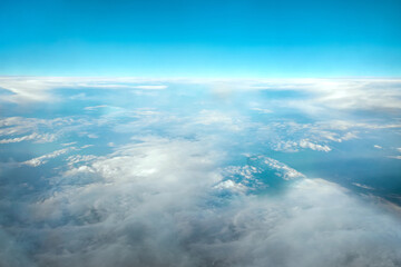 Landscape, the sky above the clouds. International cargo transportation, air travel, transport, air travel, vacation. Copy space.