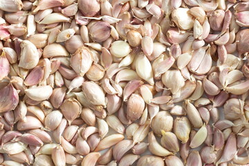 small garlic cloves with top view.