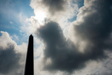 Silhouette obelisk on background