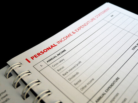 Selected focused on Personal Income and Expenditure text found on one page of a notebook. Be the title to a table of personal income entries that are still empty.