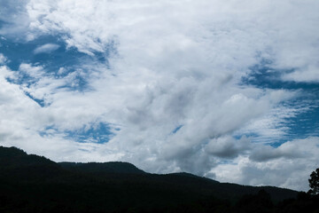 Sky and cloud concept Beautiful Blue sky and mountains. Beautiful Cumulus Cloud in the Bright Sky Background