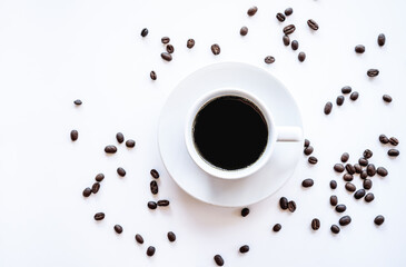 Flat lay of hot americano coffee in white coffee cup and coffee beans arrange on white background 