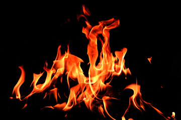 Fototapeta na wymiar flames on a black background.