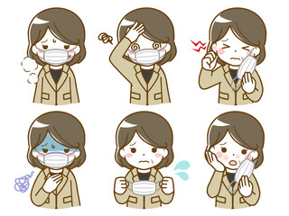 マスクがつらいスーツの中年女性