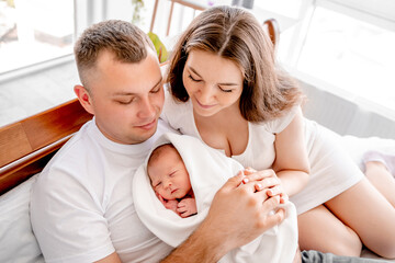 Young family with newborn daughter