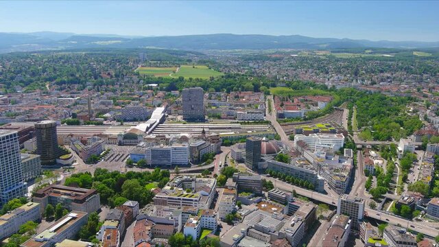 Basel: Aerial view of city in Switzerland at border with France and Germany, city outskirts with modern residential buildings, clear blue sky - landscape panorama of Europe from above