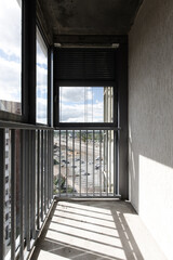 the balcony is from the inside. the concept of renovation and design of the apartment. the sun's rays through the glass.