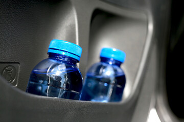 The water bottle in the car