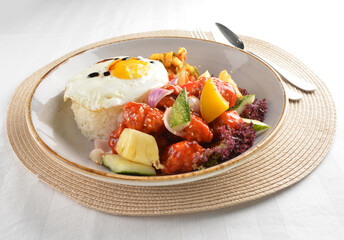 popular chef cook fried sweet and sour chicken with vegetables serve with steam white rice asian halal menu