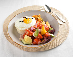 popular chef cook fried sweet and sour chicken with vegetables serve with steam white rice asian halal menu