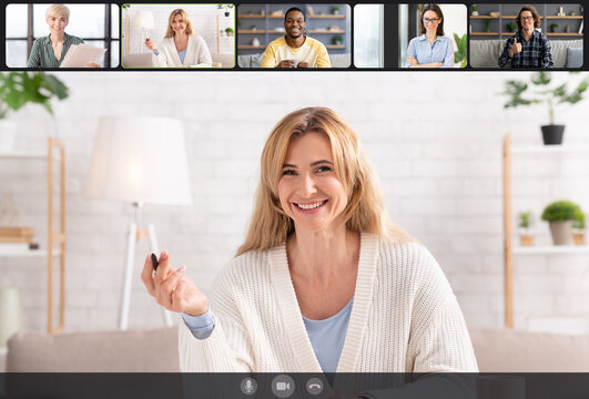 Smiling men and women having online video chat, screen view