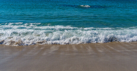 Sea waves crashing on shore