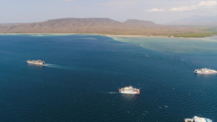 Aerial view ferry port gilimanuk with ferry boats, vehicles. Ferries transport vehicles and...