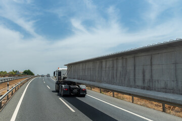 Special transport truck with a large beam used for highway bridges,