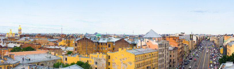 Fototapeta na wymiar Panoramic top view of the historical center, roofs of Saint Petersburg. Ligovsky Avenue in Saint Petersburg, Russia
