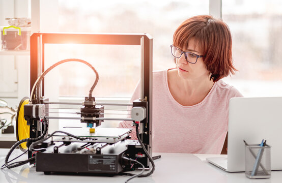 Woman Working With 3D Printer