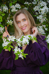 woman in a blooming flowers