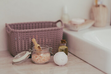 The bath bomb and other spa products in the bathroom