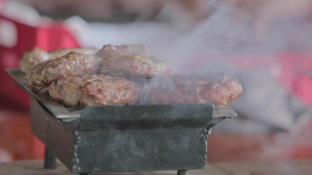 cooking meat on the fire and ingredients