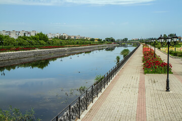 The ennobled embankment of the river.