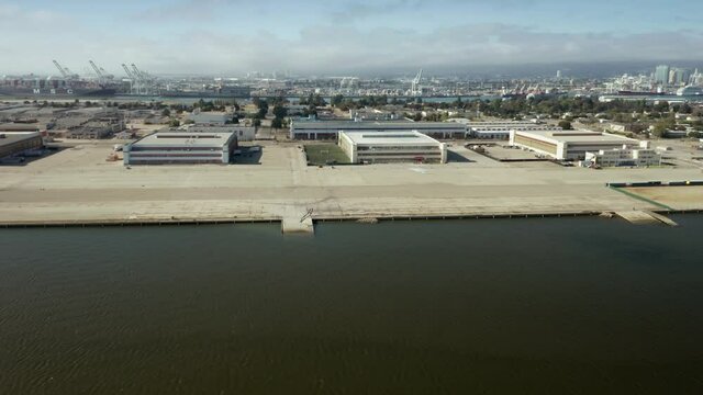 Aerial: Old Alameda naval base now being converted to private businesses. California, USA