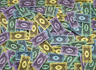 Board Game Money notes mixed up in a pile
