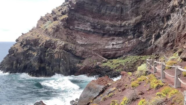 Scene of the cliff and sea in Nogales beach, La Palma Island, Canary Islands. 4K UHD