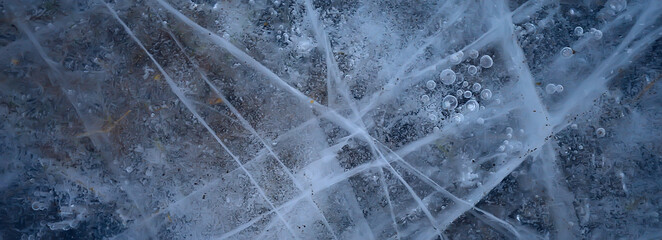 cracked ice texture, abstract seasonal winter cold background, natural ice, broken ice on a lake