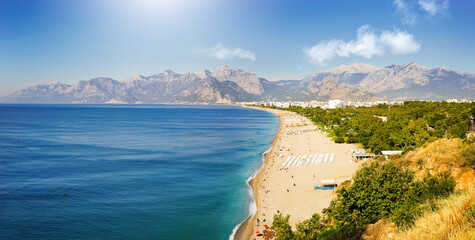 Amazingly beautiful panorama of Mediterranean resort Antalya: turquoise sea, white surf line, clean...