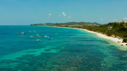 Foto op Canvas Tropisch wit strand met toeristen en hotels in de buurt van de blauwe zee, luchtfoto. Zomer en reizen vakantie concept. © Alex Traveler