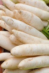 White organic Radishes on cart for sale